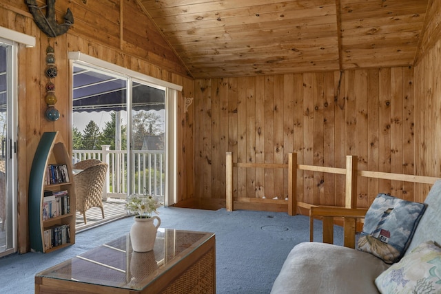 197 Ash Point Rd, Harpswell, ME 04079 - carpeted living area featuring lofted ceiling, wood walls, and wood ceiling