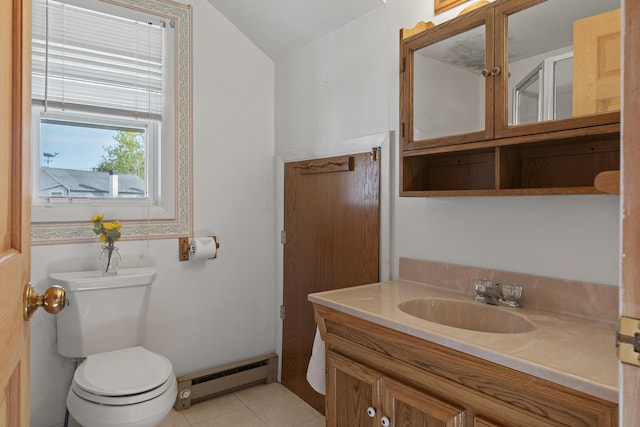 197 Ash Point Rd, Harpswell, ME 04079 - bathroom featuring baseboard heating, toilet, vanity, and tile patterned floors