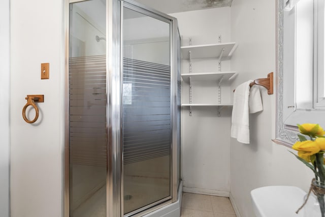 197 Ash Point Rd, Harpswell, ME 04079 - full bath featuring a shower stall, baseboards, and tile patterned flooring