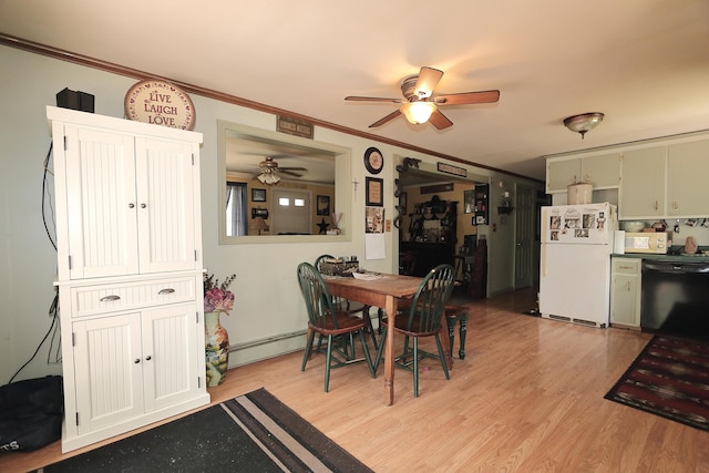 58 Skeetfield Rd, Oxford, ME 04270 - dining space with ceiling fan, ornamental molding, light wood-style floors, and a baseboard radiator