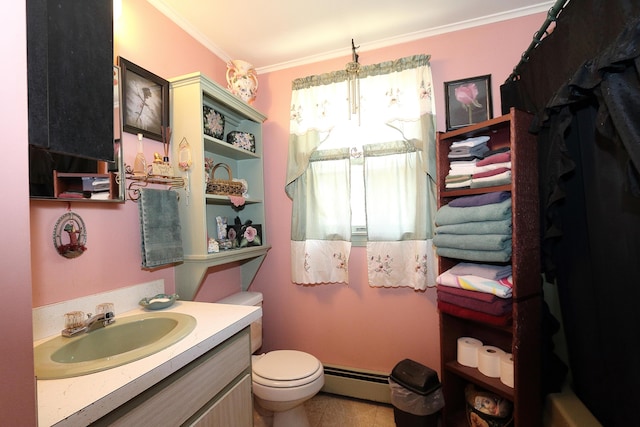 58 Skeetfield Rd, Oxford, ME 04270 - bathroom with a baseboard heating unit, toilet, crown molding, vanity, and tile patterned flooring