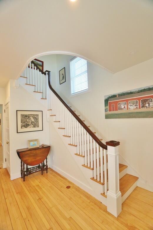 228 French St, Bangor, ME 04401 - staircase with hardwood / wood-style flooring and baseboards