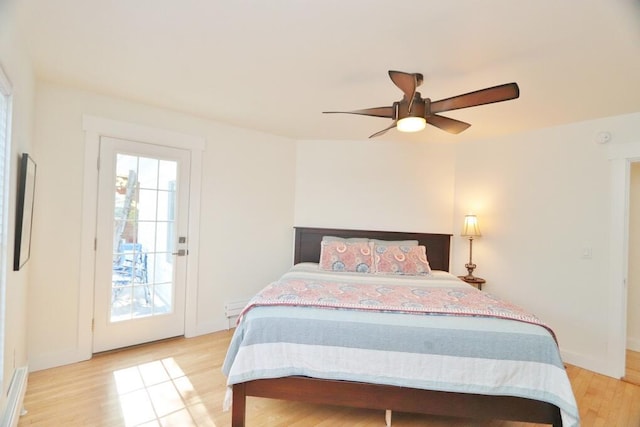228 French St, Bangor, ME 04401 - bedroom with light wood-style floors, ceiling fan, and baseboards
