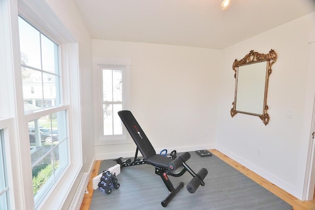 228 French St, Bangor, ME 04401 - exercise room with plenty of natural light, wood finished floors, and baseboards