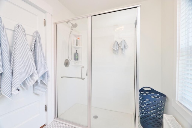 228 French St, Bangor, ME 04401 - bathroom featuring a shower stall and radiator heating unit