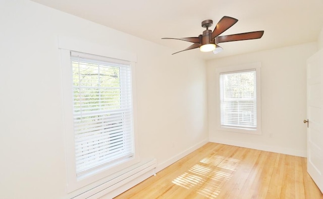 228 French St, Bangor, ME 04401 - spare room with light wood-type flooring, a ceiling fan, and baseboards