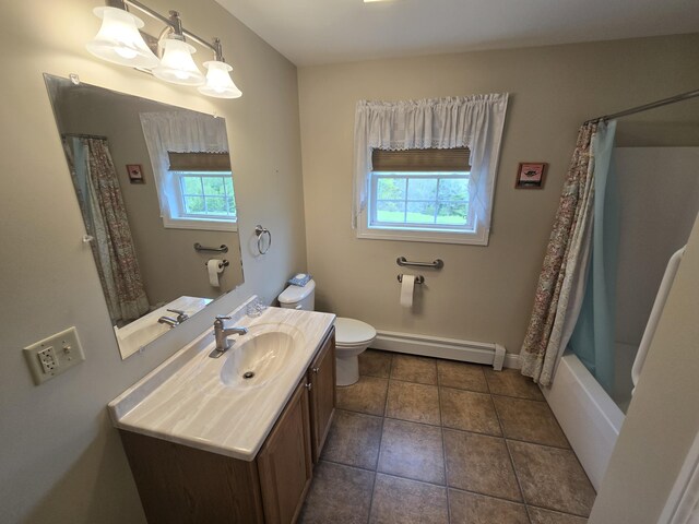 101 Streamside Ln Unit 21, Bangor, ME 04401 - full bath featuring a baseboard radiator, toilet, vanity, tile patterned floors, and baseboards