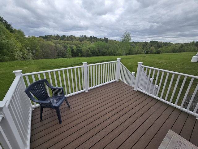 101 Streamside Ln Unit 21, Bangor, ME 04401 - wooden deck with a lawn and a forest view
