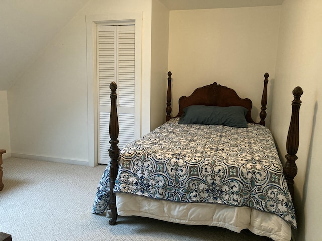 34 Highview Ave, Hancock, ME 04640 - bedroom featuring carpet flooring, vaulted ceiling, a closet, and baseboards