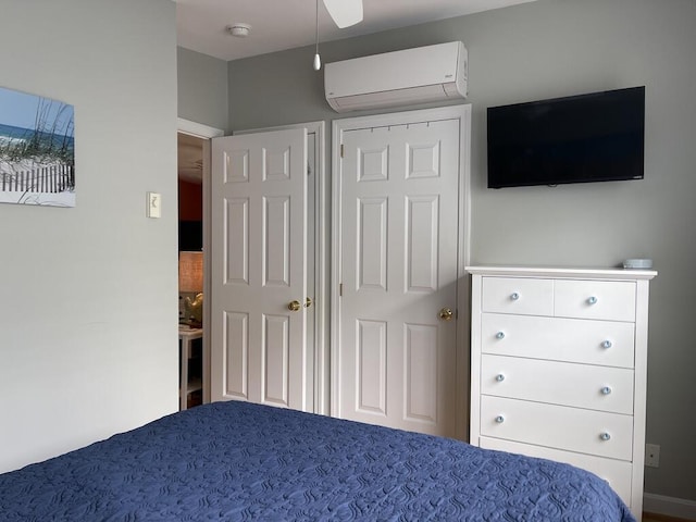 412 Post Rd Unit 253, Wells, ME 04090 - bedroom featuring an AC wall unit