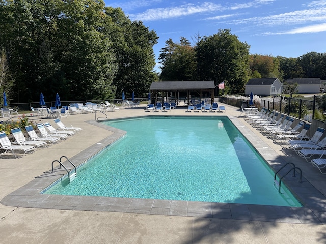412 Post Rd Unit 253, Wells, ME 04090 - community pool featuring a patio area and view of scattered trees