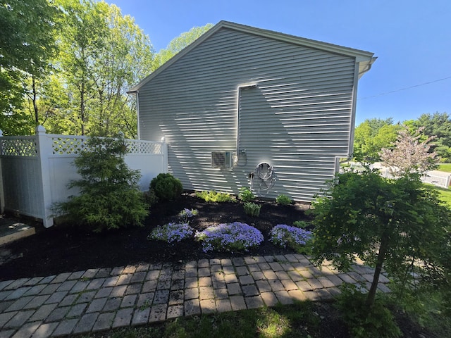 5 Roland Ave, Lewiston, ME 04240 - view of home's exterior featuring a patio area