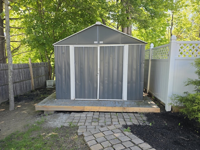5 Roland Ave, Lewiston, ME 04240 - view of shed with a fenced backyard