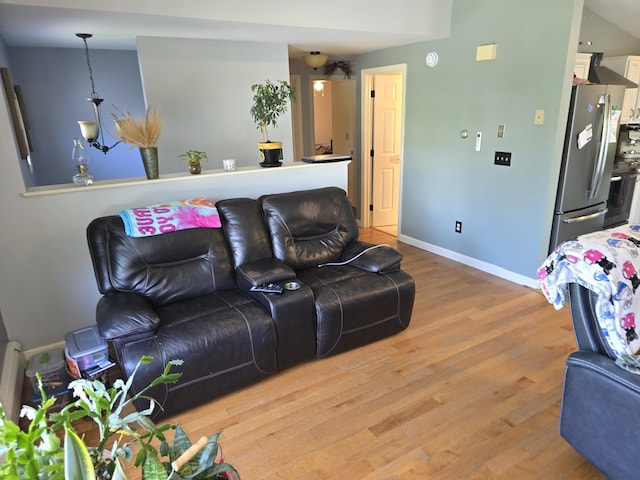 5 Roland Ave, Lewiston, ME 04240 - living area with wood finished floors and baseboards