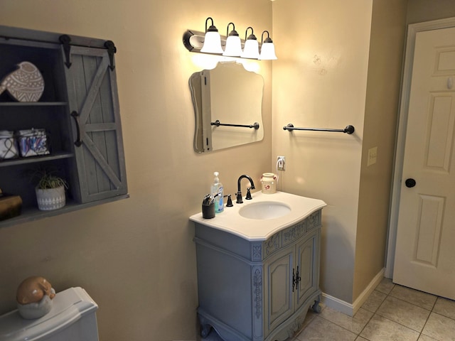 5 Roland Ave, Lewiston, ME 04240 - half bath featuring tile patterned floors, vanity, toilet, and baseboards
