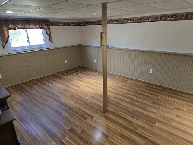 5 Roland Ave, Lewiston, ME 04240 - below grade area featuring a wainscoted wall and wood finished floors