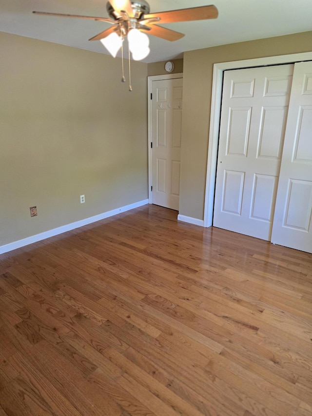 5 Roland Ave, Lewiston, ME 04240 - unfurnished bedroom featuring light wood finished floors, baseboards, a closet, and ceiling fan
