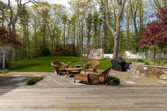 31 Rebecca Rd, Ogunquit, ME 03907 - wooden deck with grilling area, an outdoor structure, and outdoor lounge area