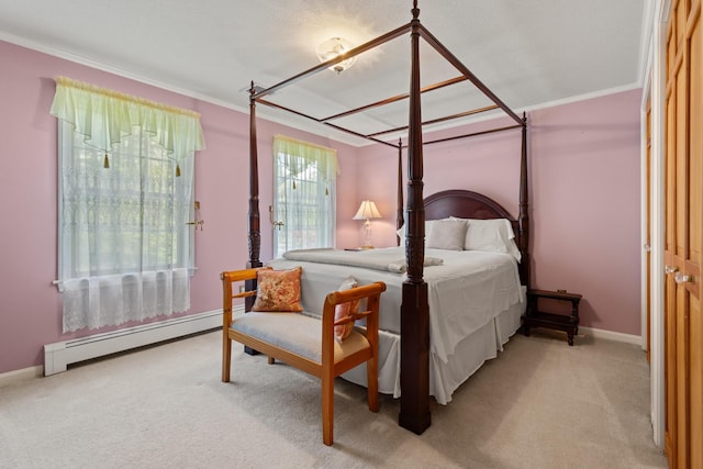 31 Rebecca Rd, Ogunquit, ME 03907 - bedroom with a baseboard heating unit, carpet flooring, baseboards, and ornamental molding