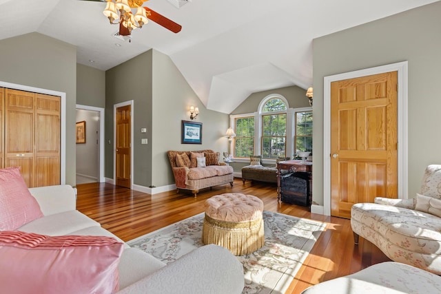 31 Rebecca Rd, Ogunquit, ME 03907 - living room with vaulted ceiling, wood finished floors, ceiling fan, and baseboards