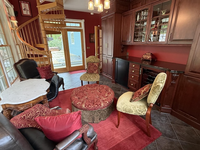31 Rebecca Rd, Ogunquit, ME 03907 - living area featuring stairs, a chandelier, and dark tile patterned floors