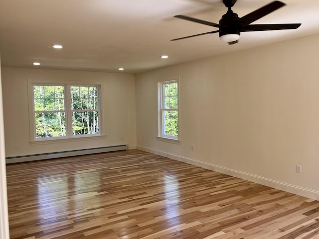 12 Windsor Rd, Ellsworth, ME 04605 - spare room featuring a baseboard heating unit, plenty of natural light, light wood-type flooring, recessed lighting, and ceiling fan
