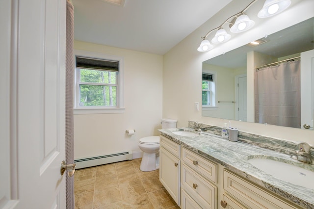 101 Thomas Pond Shore Rd, Casco, ME 04015 - bathroom with a baseboard heating unit, toilet, double vanity, baseboards, and curtained shower