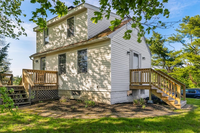185 Depot Rd, Eliot, ME 03903 - view of side of property with a wooden deck and stairs