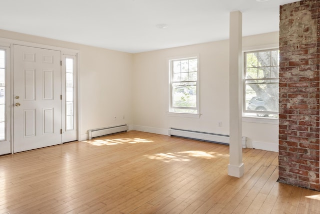 185 Depot Rd, Eliot, ME 03903 - entryway with baseboard heating, light wood-style flooring, and baseboards