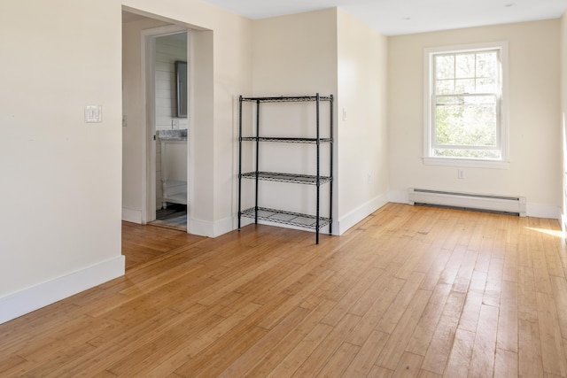 185 Depot Rd, Eliot, ME 03903 - unfurnished room featuring baseboard heating, light wood finished floors, and baseboards