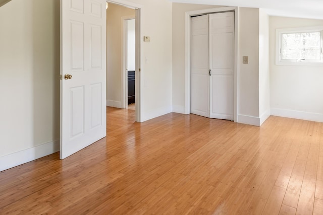 185 Depot Rd, Eliot, ME 03903 - unfurnished bedroom featuring light wood-type flooring, baseboards, and a closet