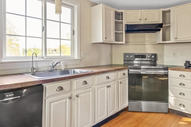 185 Depot Rd, Eliot, ME 03903 - kitchen with dishwashing machine, electric range, ventilation hood, a sink, and dark countertops