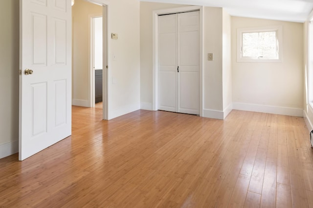 185 Depot Rd, Eliot, ME 03903 - unfurnished bedroom featuring light wood-type flooring, baseboards, and a closet