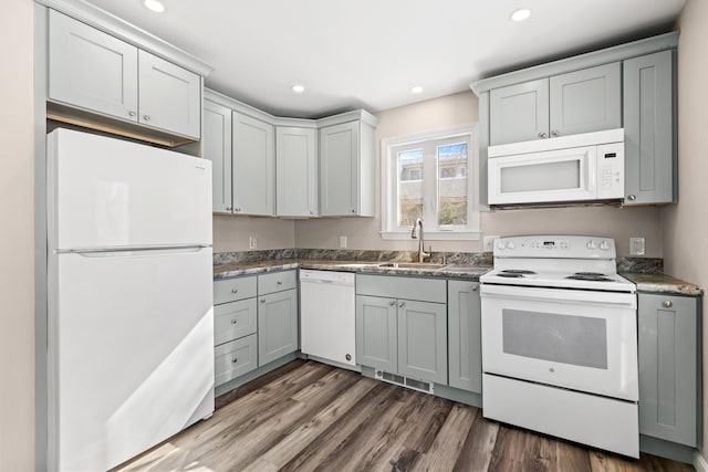 224 N St Unit 107, Saco, ME 04072 - kitchen featuring white appliances, a sink, gray cabinets, recessed lighting, and wood finished floors