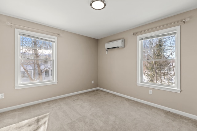 224 N St Unit 107, Saco, ME 04072 - empty room with a wall mounted AC, plenty of natural light, and carpet