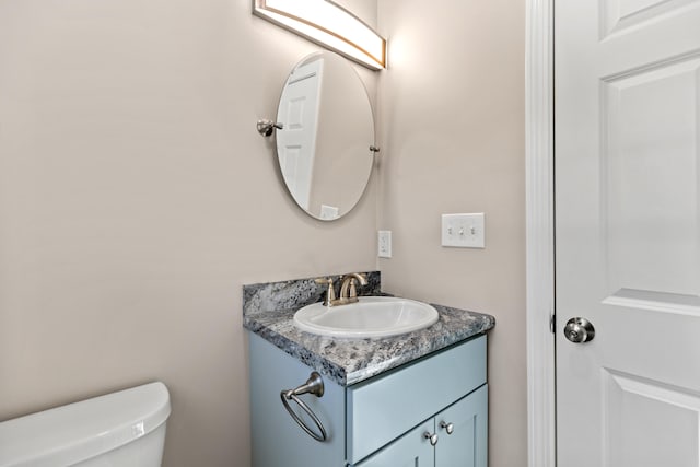 224 N St Unit 107, Saco, ME 04072 - half bathroom with vanity and toilet