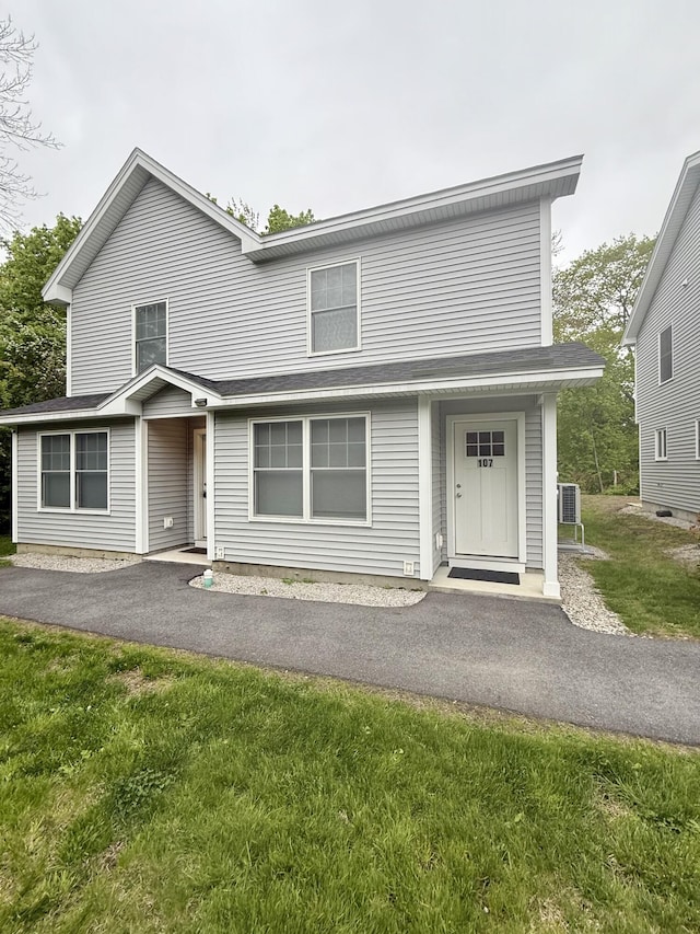 224 N St Unit 107, Saco, ME 04072 - view of front of property with a front lawn and central air condition unit