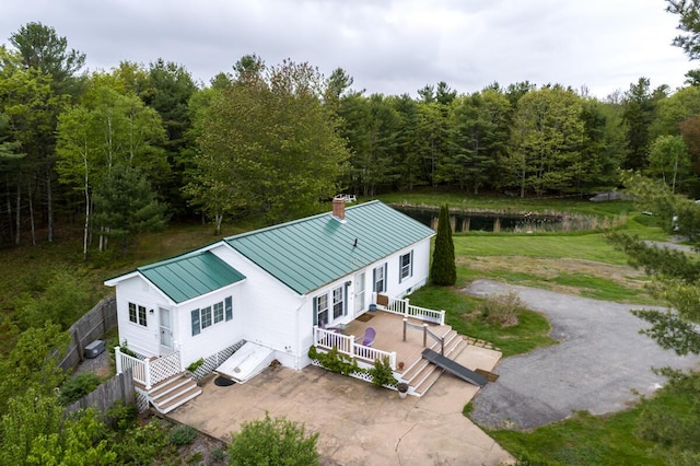 31 Lakeview Dr, West Bath, ME 04530 - view of subject property with a heavily wooded area and a nearby body of water