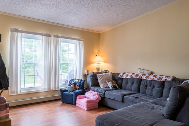 31 Lakeview Dr, West Bath, ME 04530 - living area featuring a baseboard radiator, ornamental molding, a textured ceiling, and wood finished floors