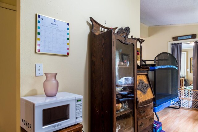 31 Lakeview Dr, West Bath, ME 04530 - bedroom featuring wood finished floors and ornamental molding