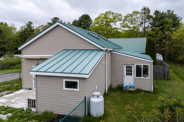31 Lakeview Dr, West Bath, ME 04530 - view of property exterior with metal roof and a standing seam roof