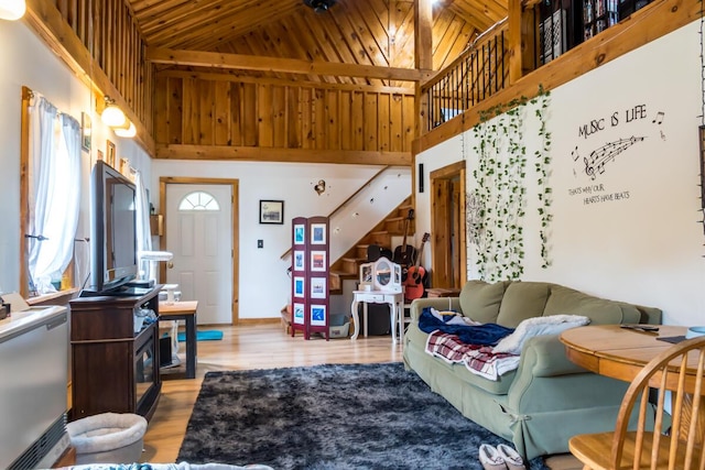 31 Lakeview Dr, West Bath, ME 04530 - living room featuring wood ceiling, high vaulted ceiling, light wood-type flooring, and baseboards