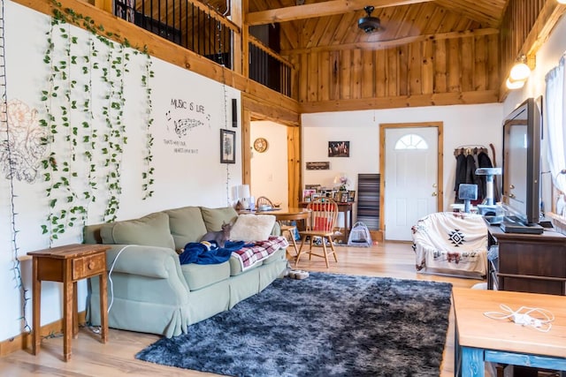 31 Lakeview Dr, West Bath, ME 04530 - living room featuring light wood-style flooring, high vaulted ceiling, and wooden ceiling with exposed beams