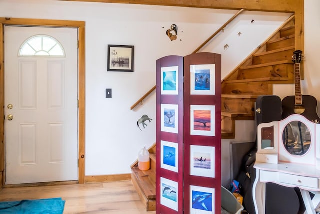 31 Lakeview Dr, West Bath, ME 04530 - foyer featuring wood finished floors, stairs, and baseboards