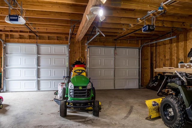 31 Lakeview Dr, West Bath, ME 04530 - garage featuring a garage door opener
