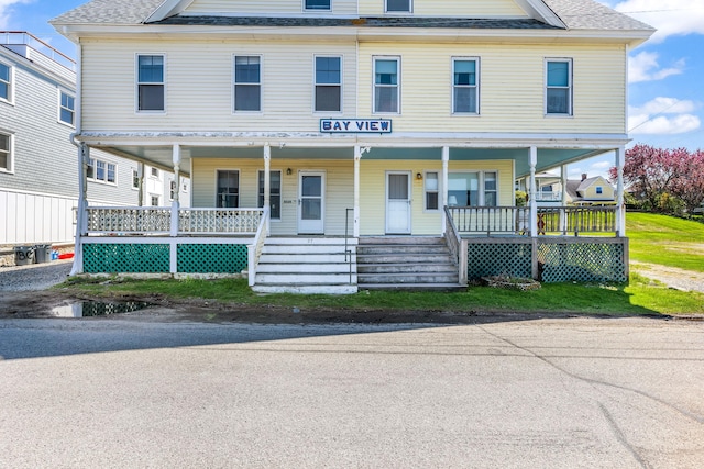 27 Ocean Ave Extension Unit 2, York, ME 03909 - townhome / multi-family property with a porch and roof with shingles