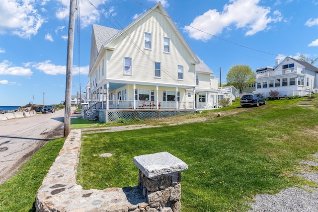 27 Ocean Ave Extension Unit 2, York, ME 03909 - view of front of property with covered porch and a front yard