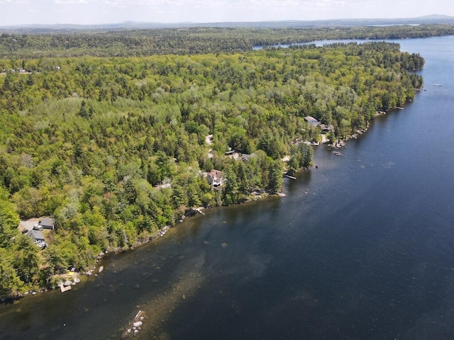 101 Brooks & Dunn Road, Otis, ME 04605 - aerial view of property and surrounding area featuring a heavily wooded area and a large body of water
