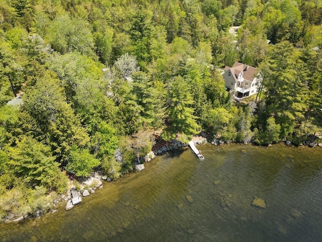 101 Brooks & Dunn Road, Otis, ME 04605 - aerial view of property and surrounding area featuring a heavily wooded area and a nearby body of water