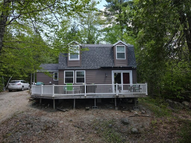 101 Brooks & Dunn Road, Otis, ME 04605 - back of house with a shingled roof and a wooden deck